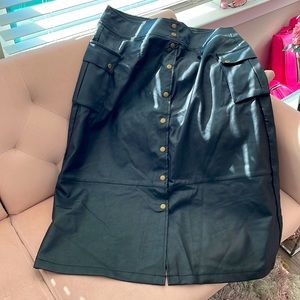 Faux leather.,black skirt., 16
